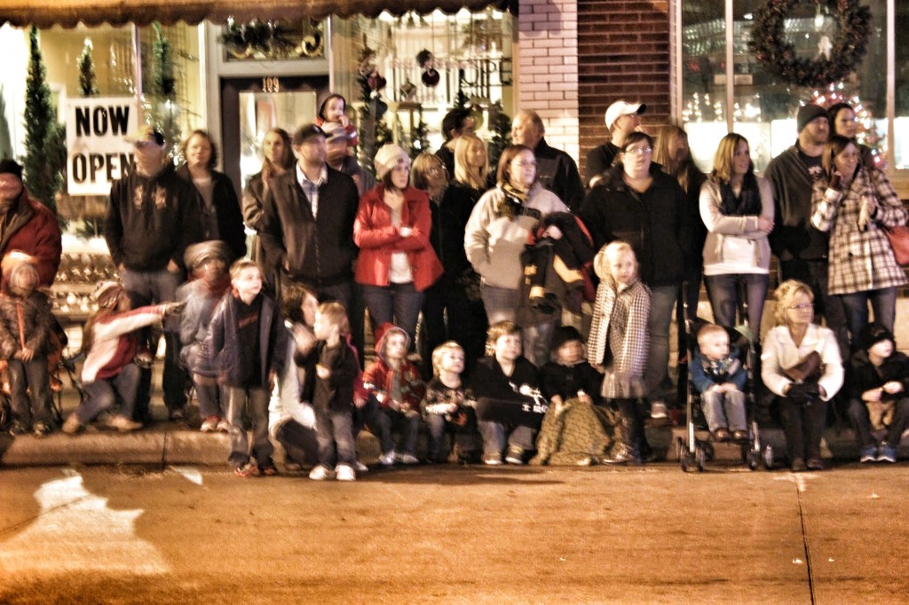 The crowd watched as Rudolph led the way pulling Santa's sleigh